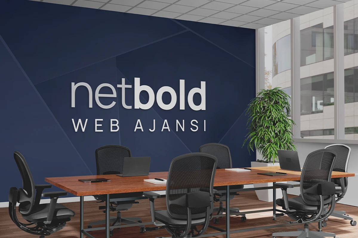A meeting room at the Netbold Web Agency office with the agency logo on the wall